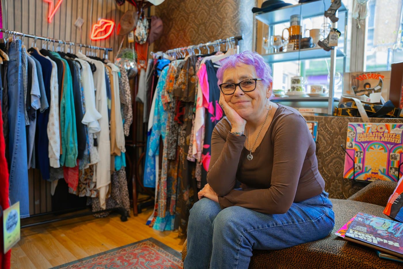 A vintage clothing shop and its owner